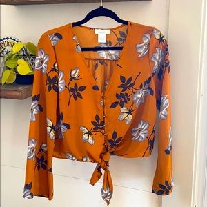 Burnt orange floral blouse